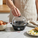 Elite Gourmet EGC-007B# Rapid Egg Cooker, 7 Easy-To-Peel, Hard, Medium, Soft Boiled Eggs, Poacher, Omelet Maker, Auto Shut-Off, Alarm, 16-Recipe Booklet, BPA-Free, Black